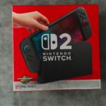 A person is holding a nintendo switch.